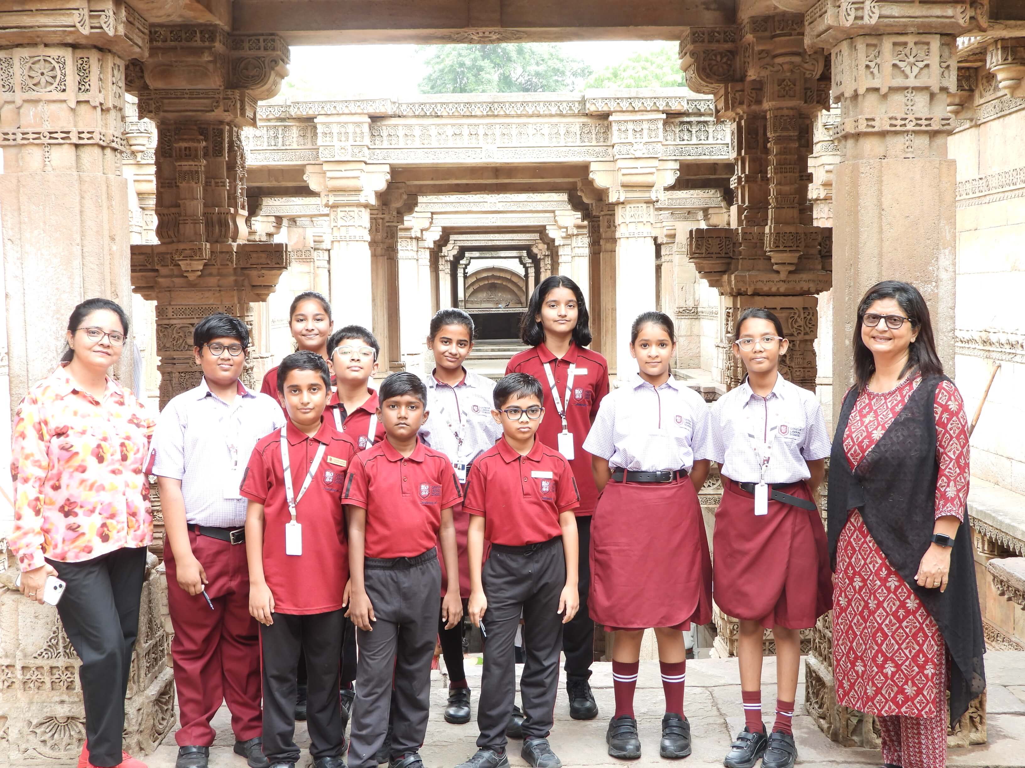 Students and teachers on a field trip to a historic stepwell